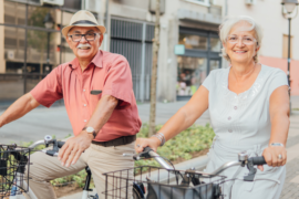 older couple riding bike